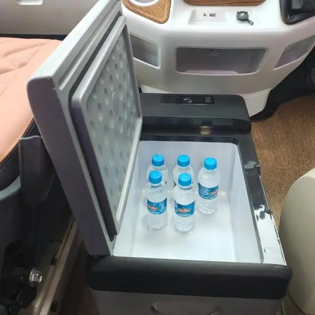 Onboard refrigerator stocked with water bottles