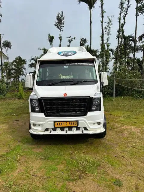 White Maharaja Tempo Traveller, front view