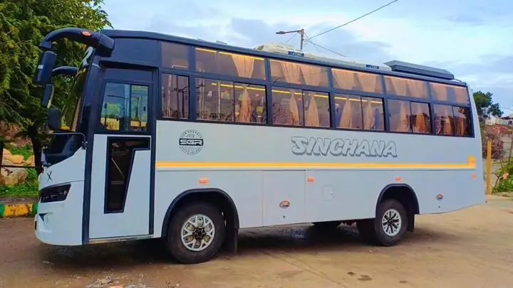 White mini bus, side view