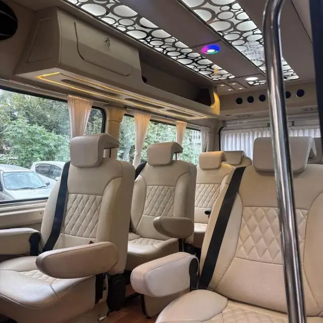 Cream leather captain seats inside a luxury van