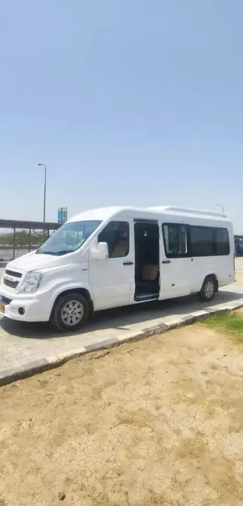 White van parked on open ground