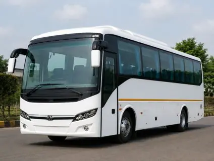 White bus with a gold stripe